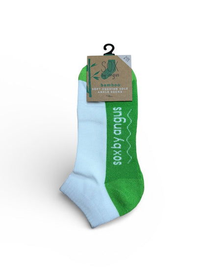 Green and light blue sock with a cardboard tag on a white background