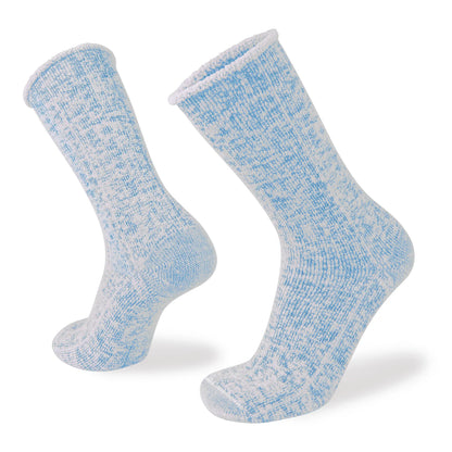 A pair of calf-length merino fleece socks with a textured pattern, featuring a relaxed top and anatomical toe box.