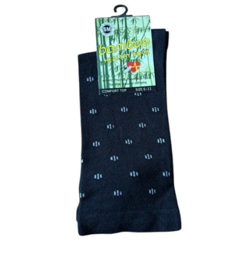 Navy blue socks with white pattern on a white background, featuring a green label.