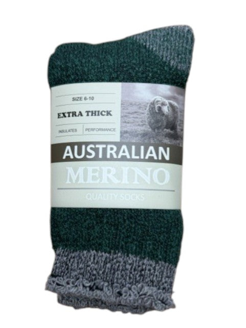 Pair of green and gray socks with a label on a white background