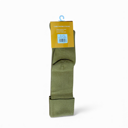 Green sock with a yellow label on a white background