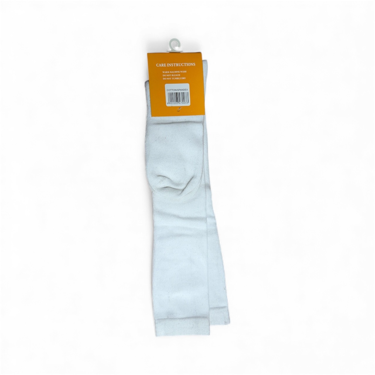 White knee-high socks with a care label on a white background