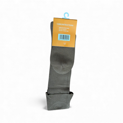 Gray sock with a care instructions label on a white background