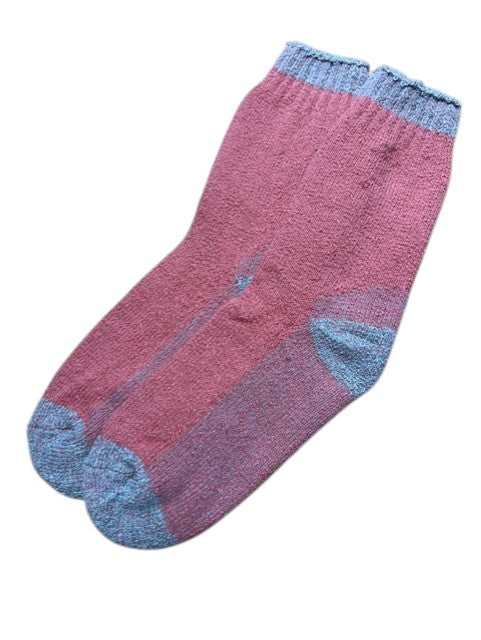 fuchsia socks on a white background
