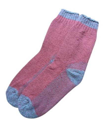 fuchsia socks on a white background
