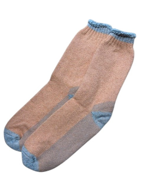 Pair of brown socks with blue accents on a white background