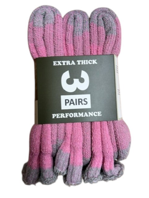 Pink and gray socks with a label indicating 'Extra Thick' and 'Performance'.