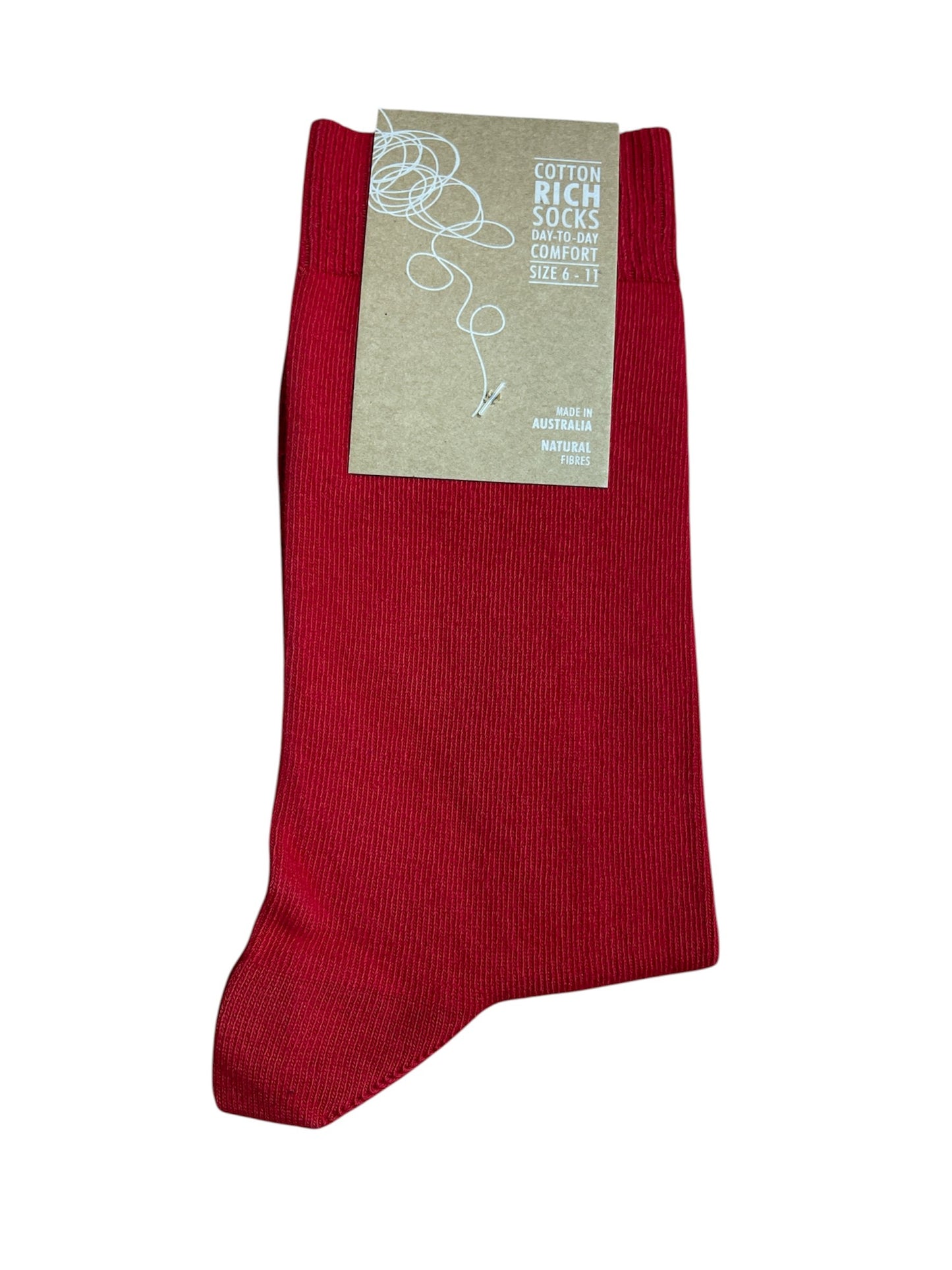 Red sock with a beige label on a white background