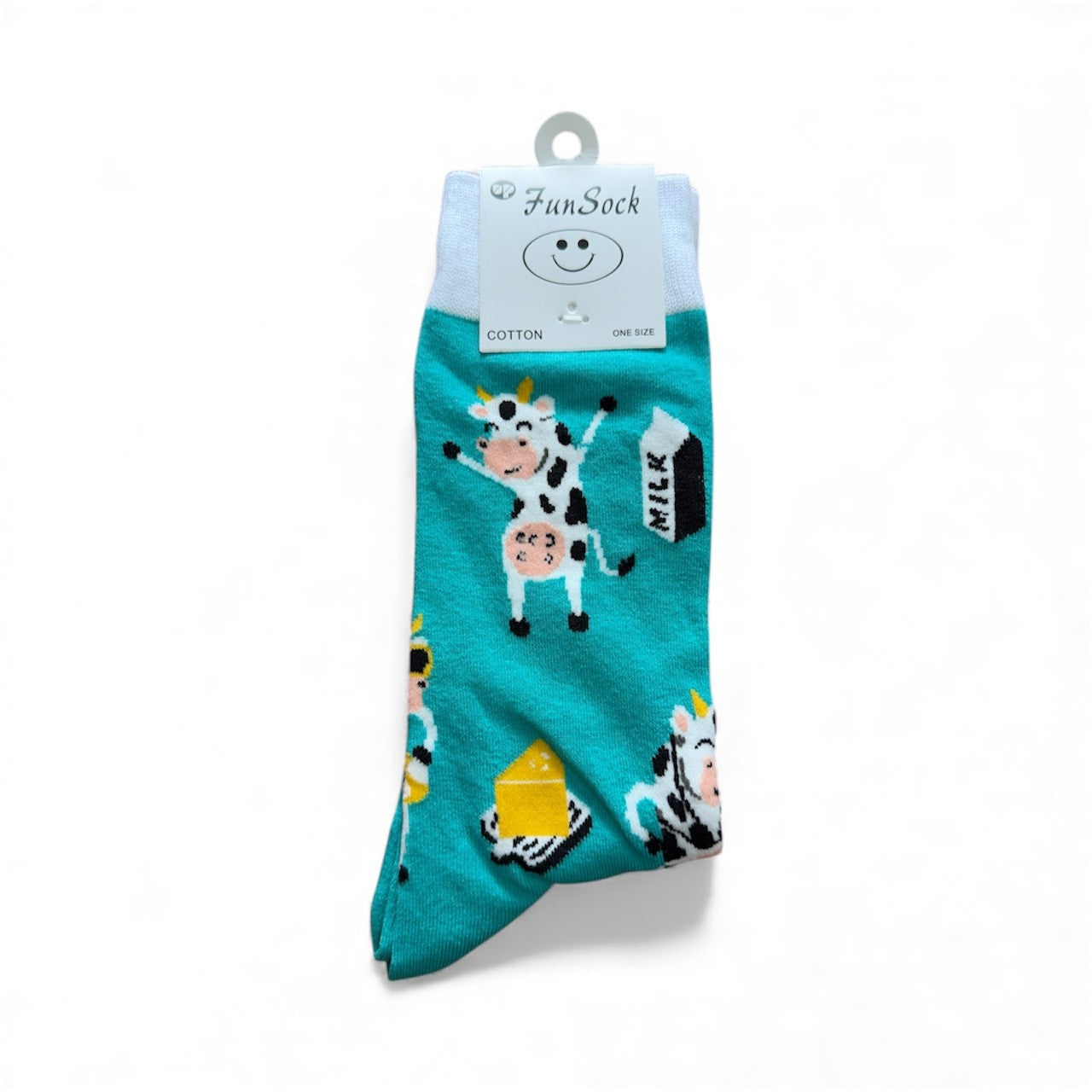 Teal sock with cow and milk carton design on a white background
